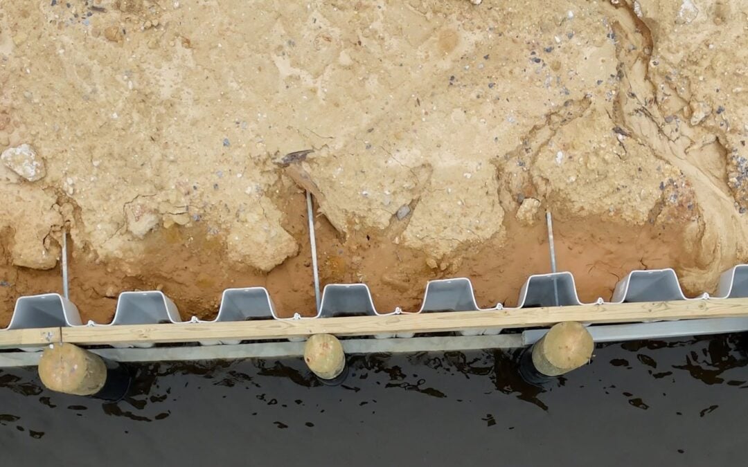 Vinyl Bulkhead Installation vs Wood: What Property Owners Need to Know